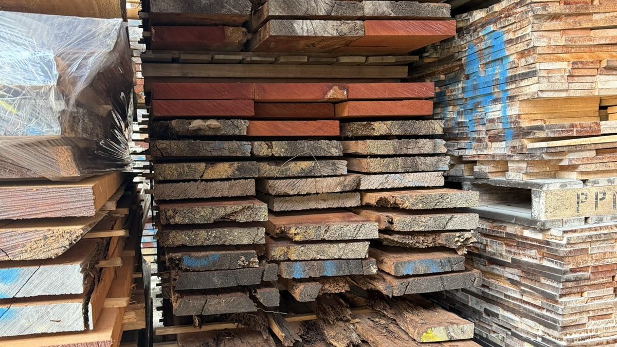 Kiln-dried tropical hardwood stacked in a Malaysian timber yard