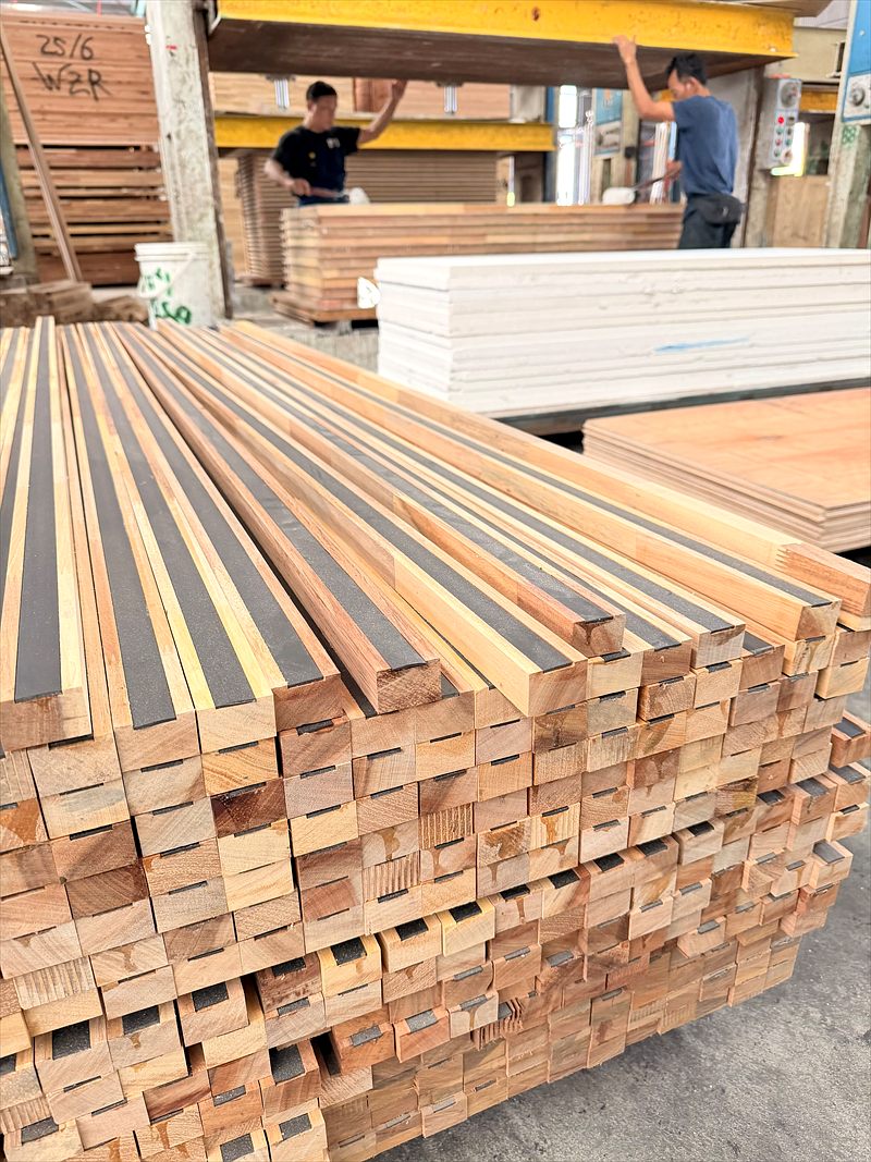 Long stack of finger-jointed door core components at the mill